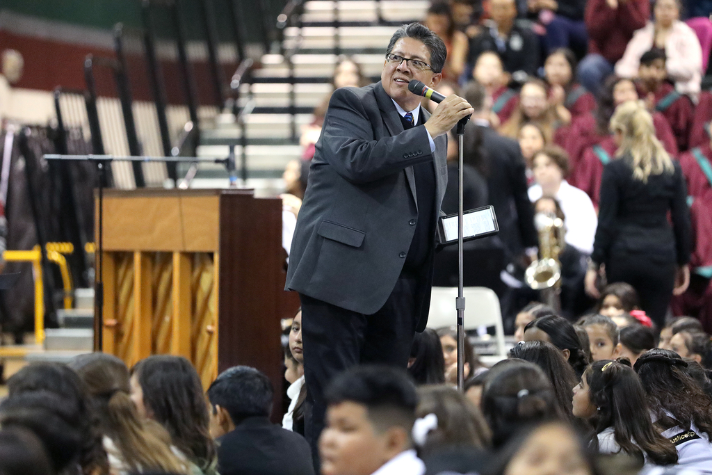 Ric Campero at mic emceeing Singsational