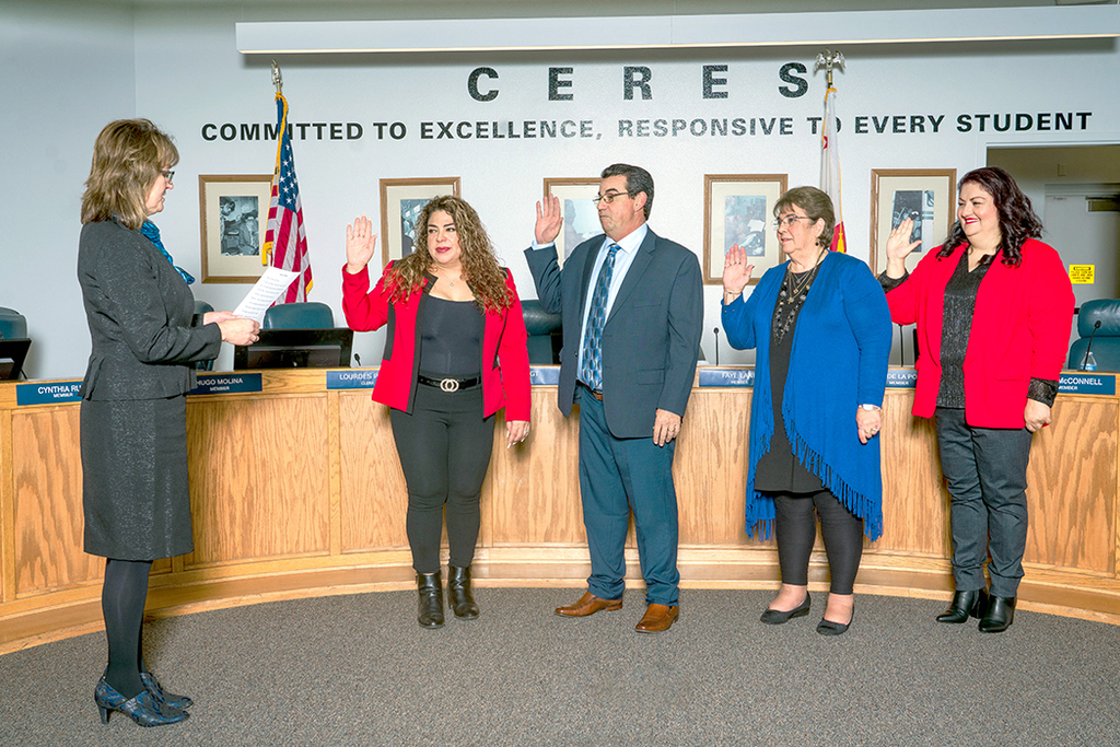 Superintendent Denise Wickham swears in Trustees Cynthia Ruiz, Dave McConnell, Valli Wigt and Lourdes Perez