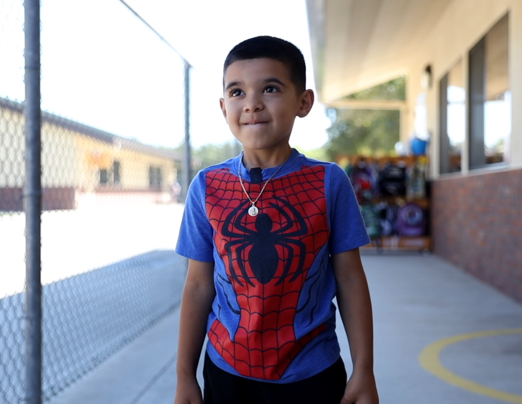 Little boy in Spiderman shirt