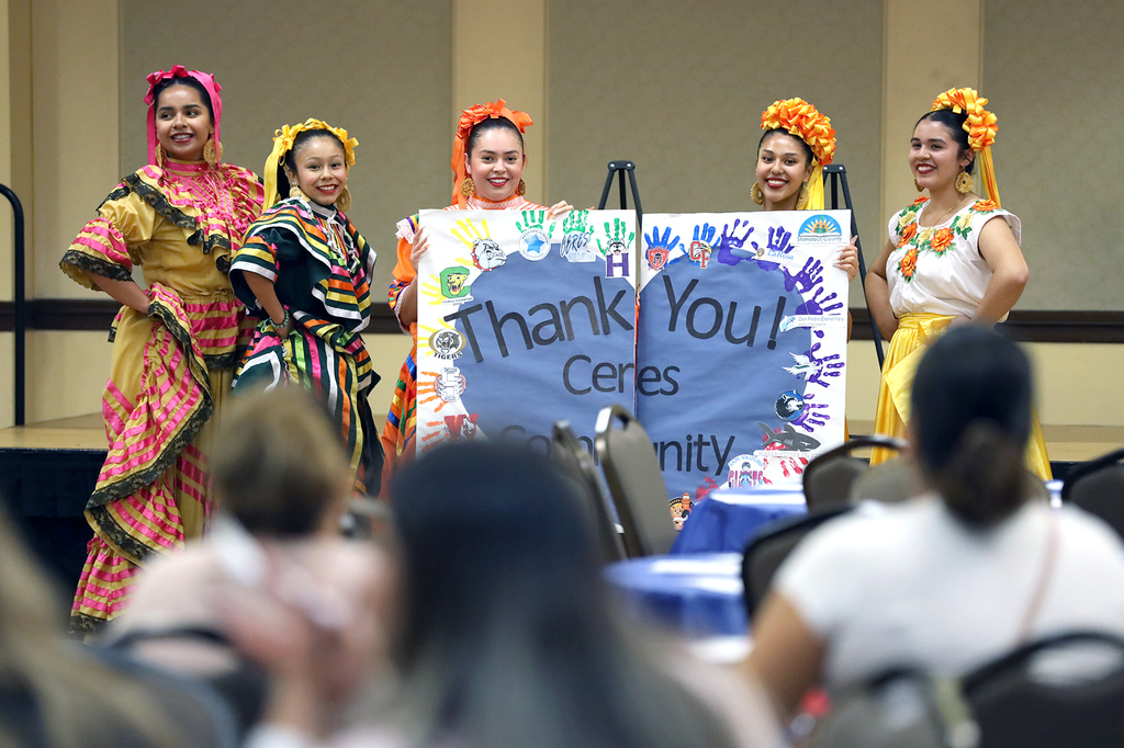 Folklorico dancers hold "Thank You Ceres Community" poster