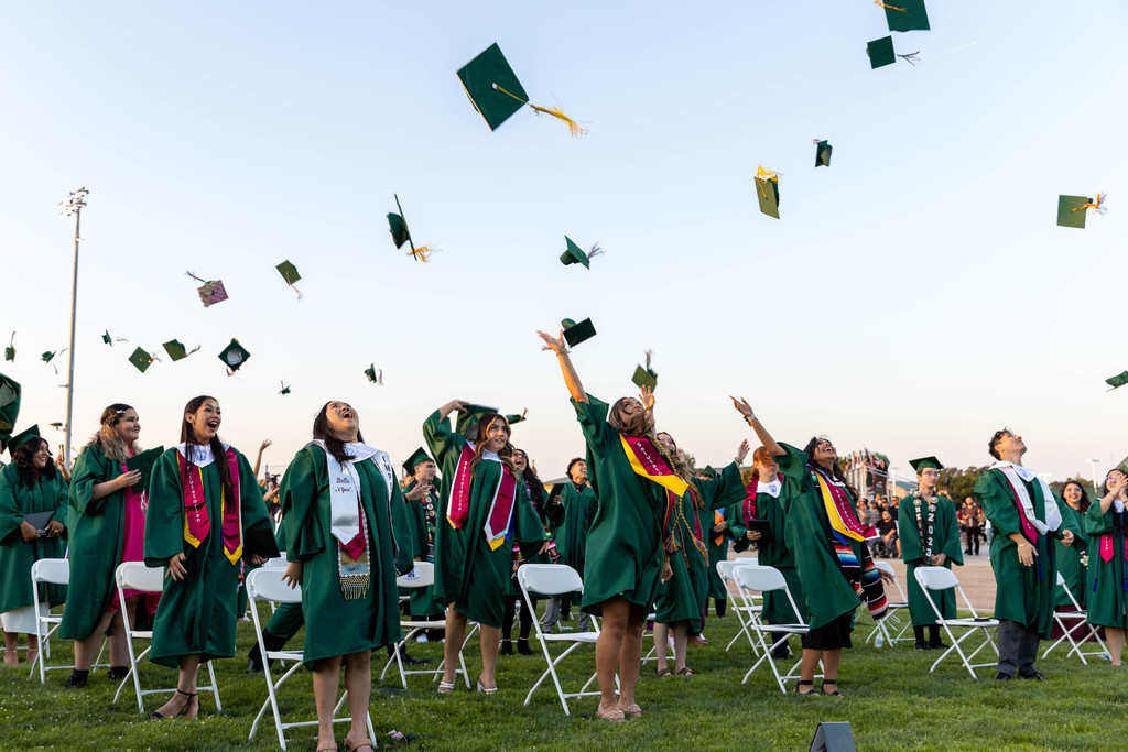 CVHS students toss graduation caps into the air