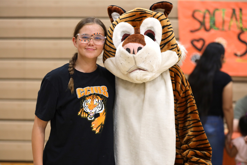 Cesar Chavez Tiger mascot and student