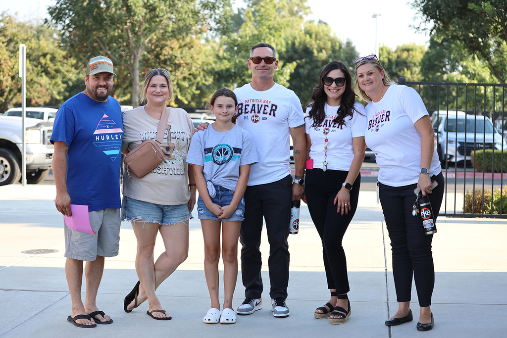 PKB staff and students smile for the camera